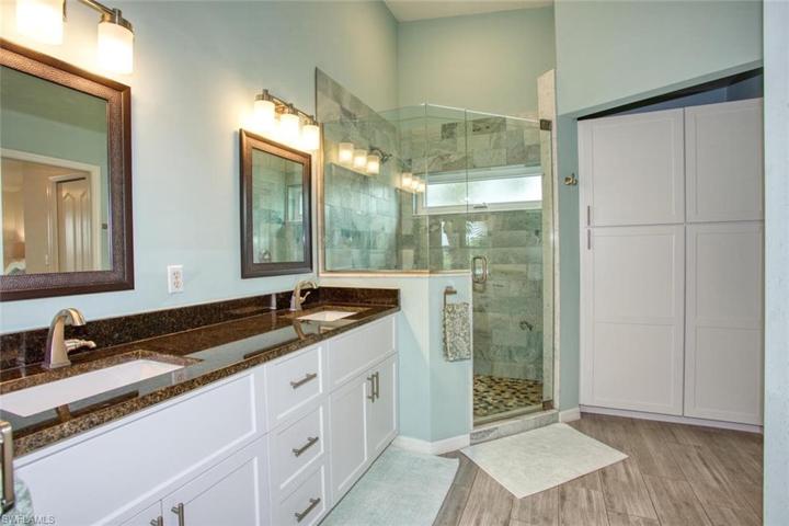 Primary bath, walk-in shower, storage