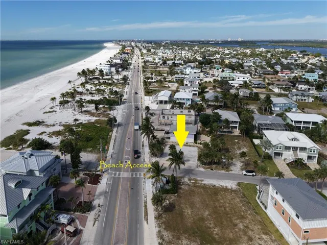Vacant lot on corner of Estero Blvd and Hercules DR across from beach access
