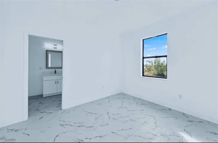 Empty room featuring sink