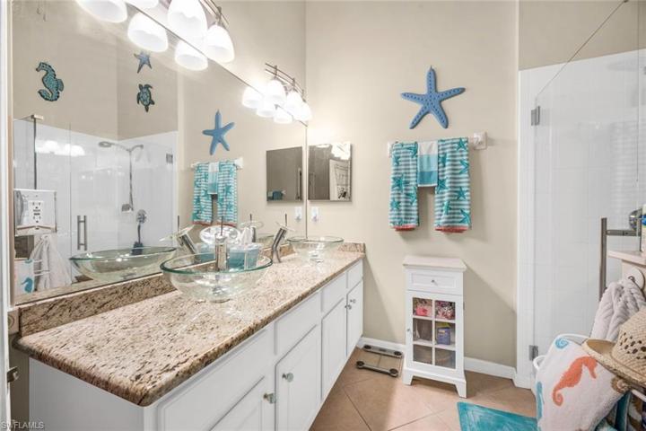 Master Bathroom Granite Countertops/ Glass Bowl Sinks