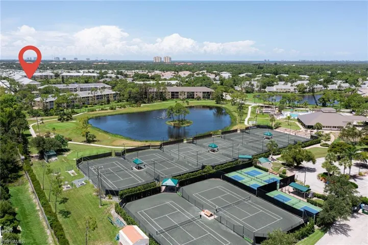 Aerial view of tennis and pickleball courts showing proximity to the subject condo.