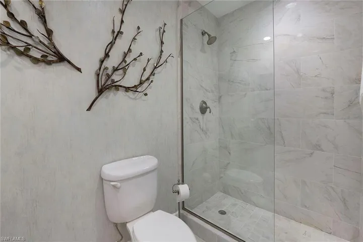 Full bath featuring a walk in shower