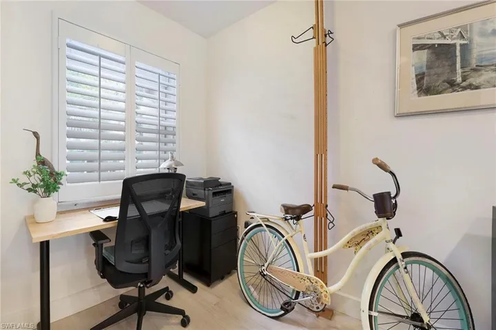 Office featuring wood finished floors