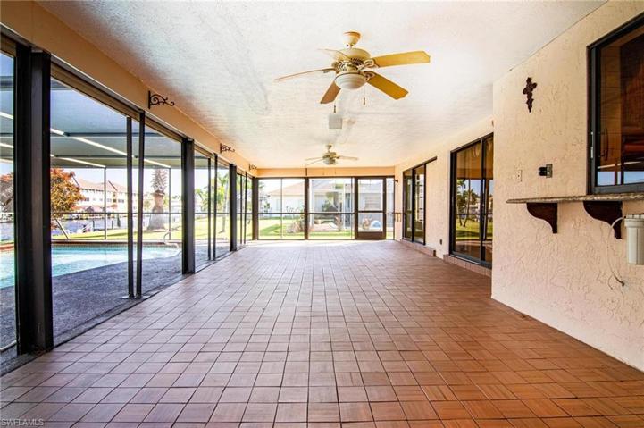 Electric roll down shutters protect lanai area