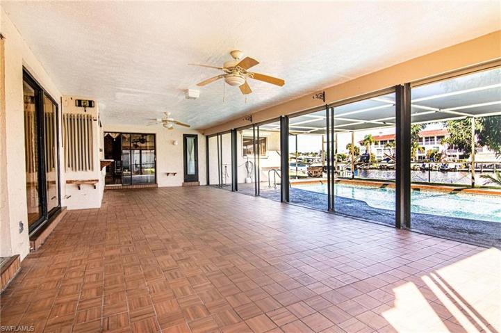 HUGE tiled lanai under truss!!