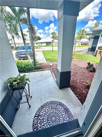 Covered porch with a residential view