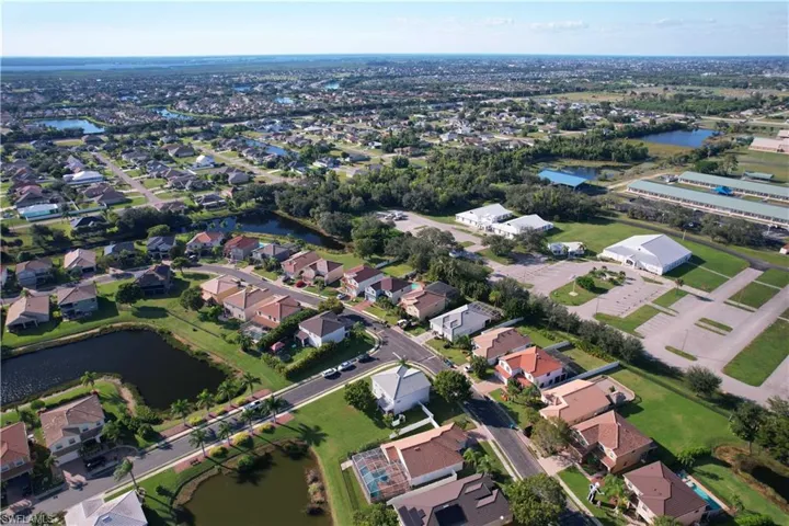 View of property location with nearby suburban area