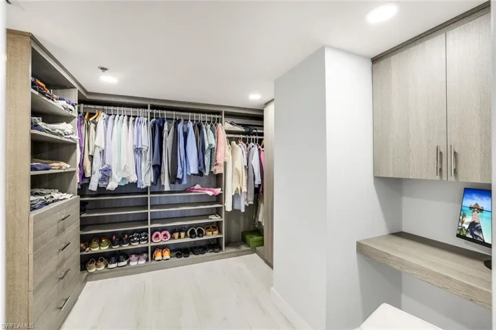Walk in closet featuring light wood finished floors