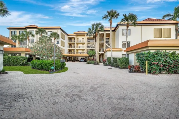 View of 6820 Pelican Bay Blvd in Iterlachen with close proximity to the Pelican Bay trams and beach facilites