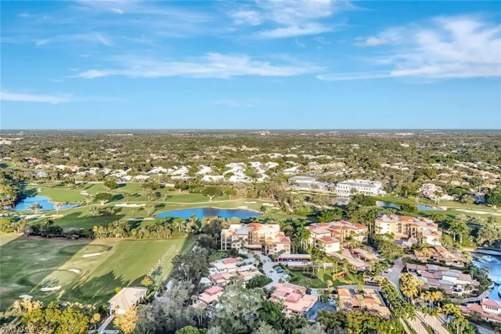 Interlachen is surrouned by lush landscaping and ponds in Pelican Bay