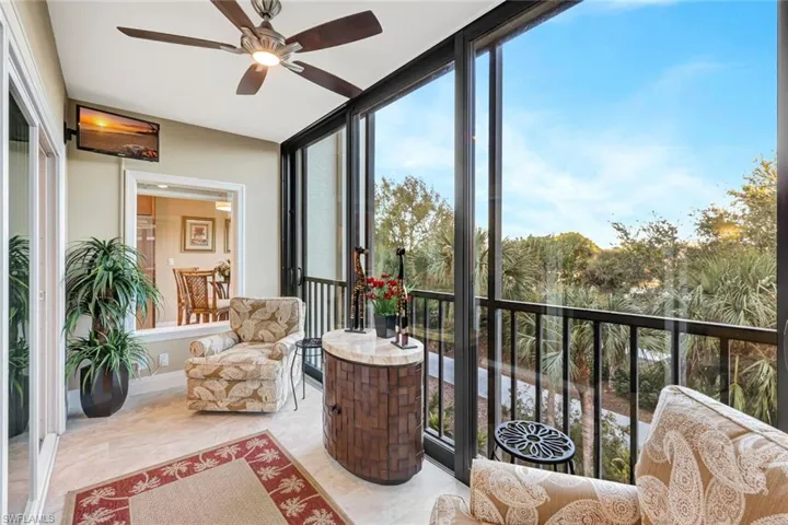 Light , bright sunroom just off the great room