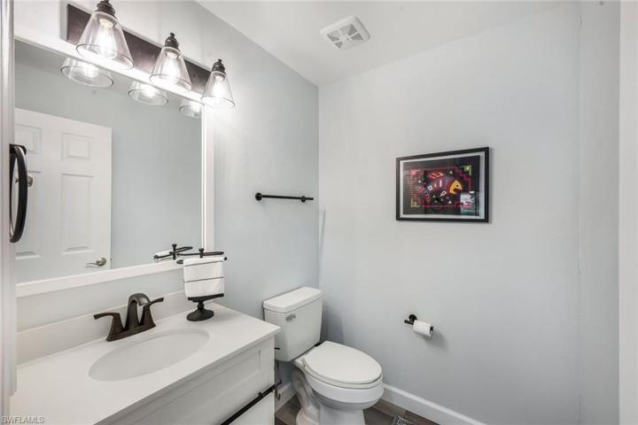 Guest Powder Room Located off Main Living Area