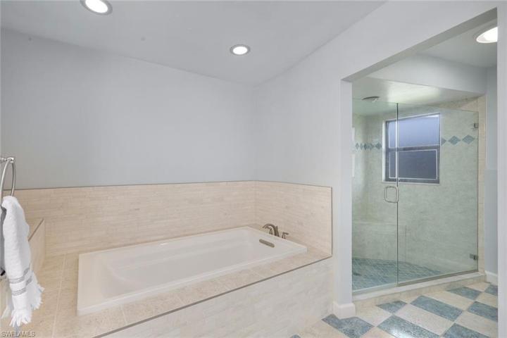 Large Glass Step In Shower with Natural Lighting