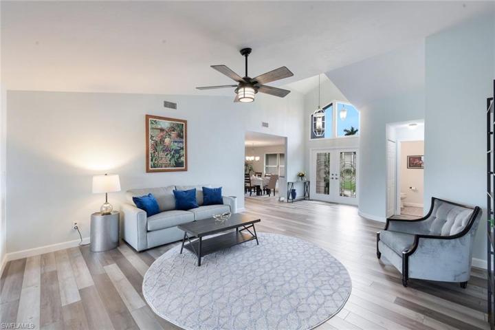 Long View of Living Area into Formal Dining Area