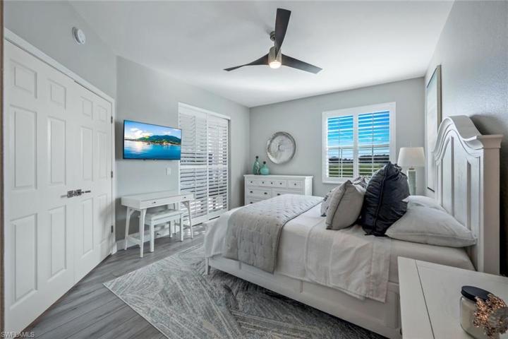 Enter your French doors to your primary suite with wonderful natural light!
