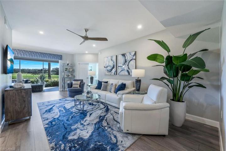 Beautiful living room open to the dining and outdoor views!