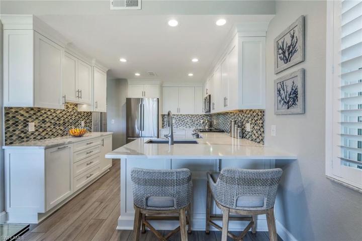 Well thought out kitchen renovation with kitchen counter seating for family and friends!