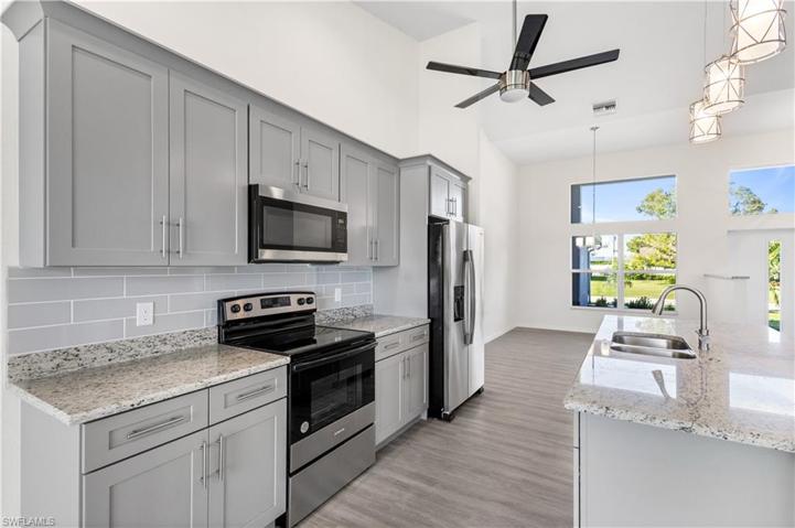 46' wood cabinets, granite, stainless steel