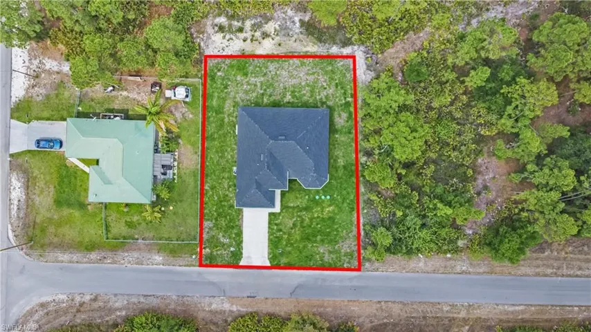 Aerial overview of property's location with property parcel outlined