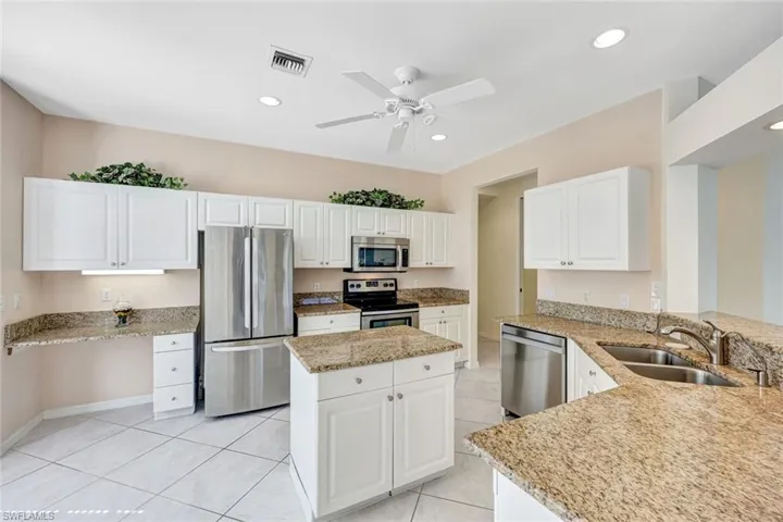 Featuring granite and newer stainless appliances.