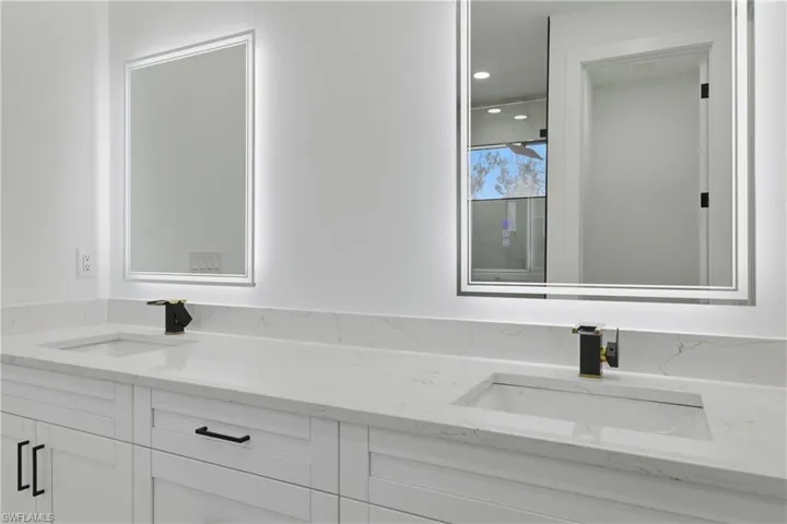 Bathroom featuring double vanity
