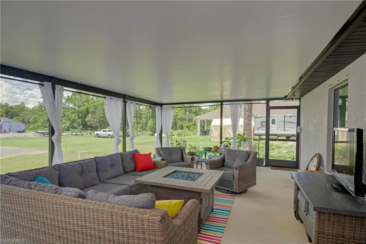 Sunroom with an outdoor living space