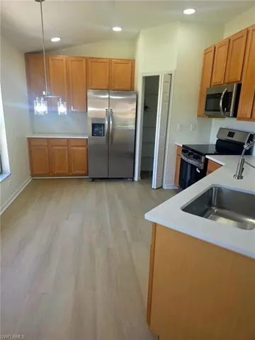 New Quartz, flooring, lighting and appliances