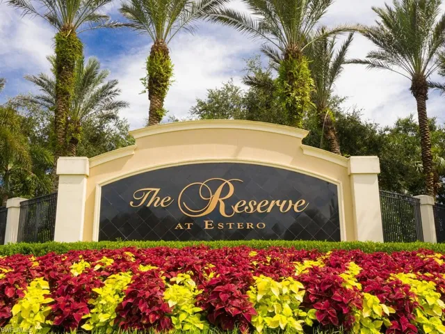 View of the community sign at the entrance of the guarded gate.