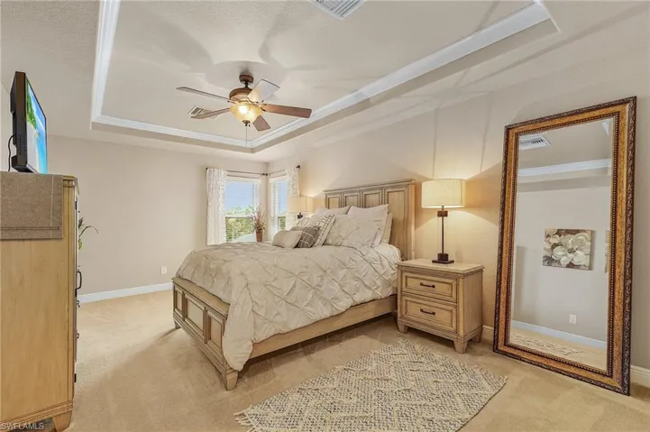 View of the upstairs loft, currently utilized as a fourth bedroom, which offers versatile options and can easily serve as an office or game room.