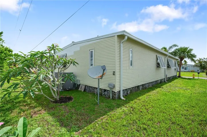 View of home's exterior featuring a lawn