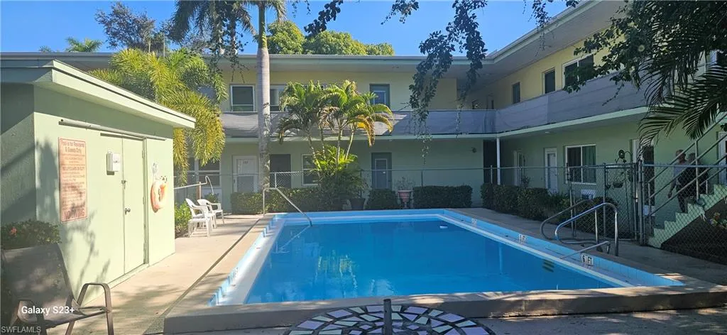 Community pool featuring a patio area