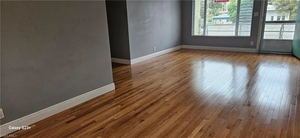 Unfurnished room with light wood-type flooring
