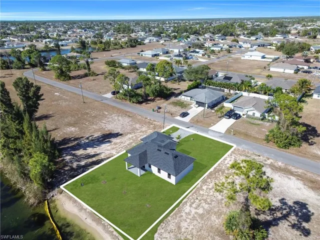 View of property location with nearby suburban area