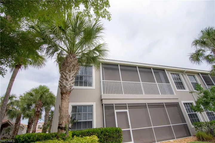 View of rear of property that shows screened lanai.