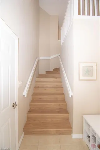Upon entry, you will find a large foyer area and stairs that feature attractive luxury vinyl plank flooring.
