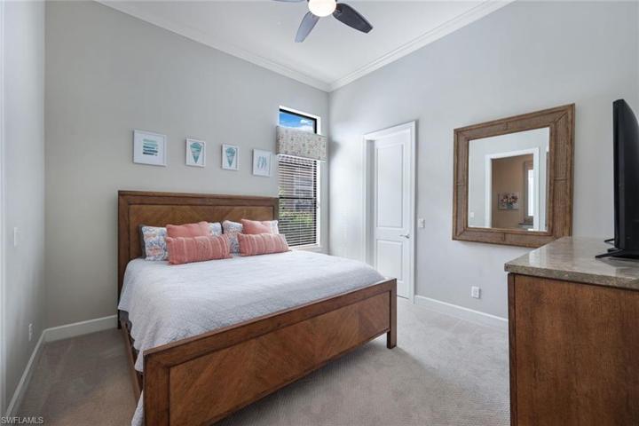 The second bedroom is quite spacious, with plenty of closet space and its own en suite bathroom.