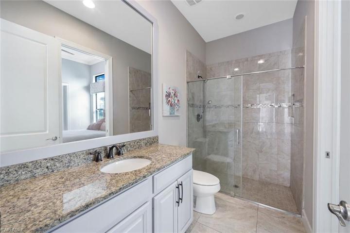 Second Full bath serves as an ensuite for bedroom 2 as well as a pool bath.