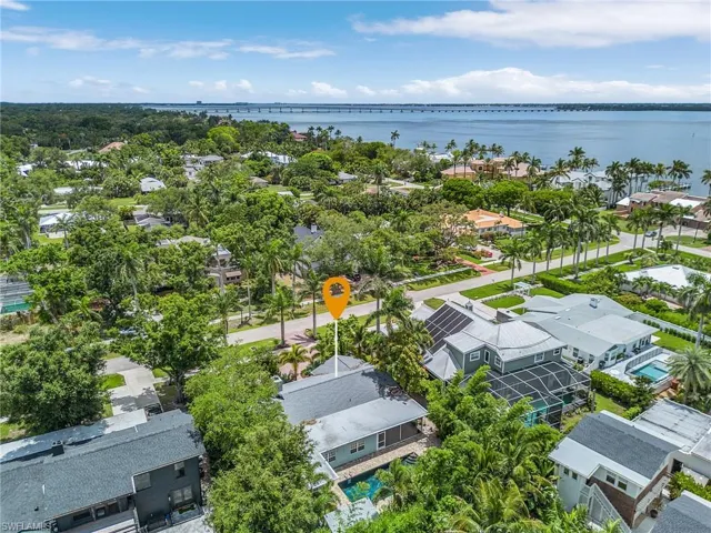 Aerial view of residential area with a nearby body of water