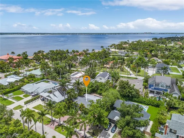 Aerial view of residential area with a nearby body of water