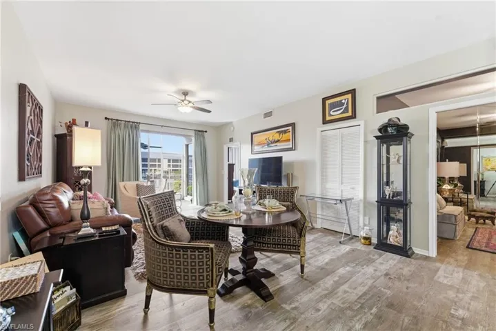 Dining area featuring light wood finished floors and ceiling fan