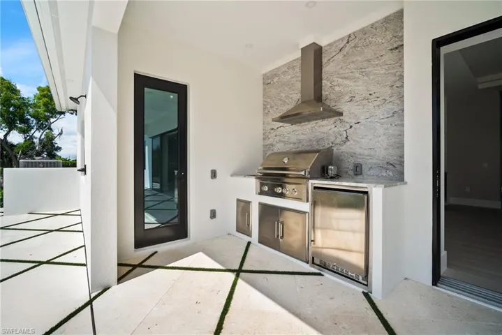 View of patio / terrace featuring exterior kitchen