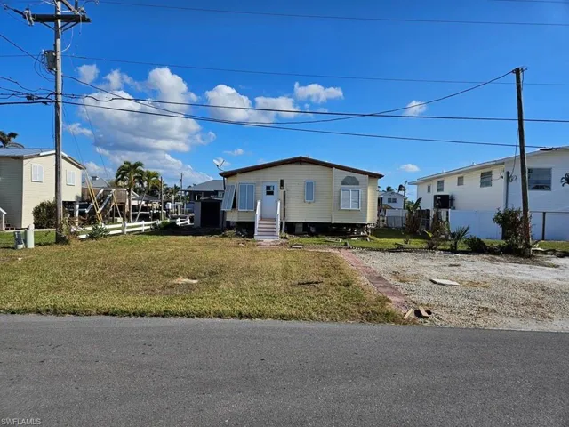 View of front of house with a front lawn
