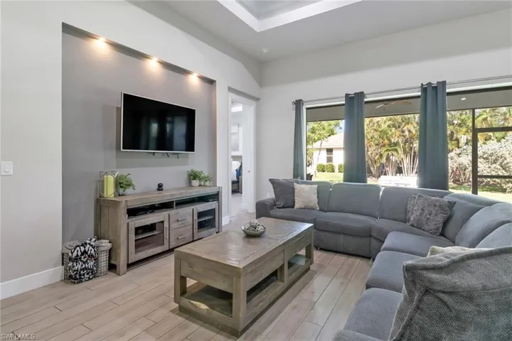 Living room with light wood-type flooring