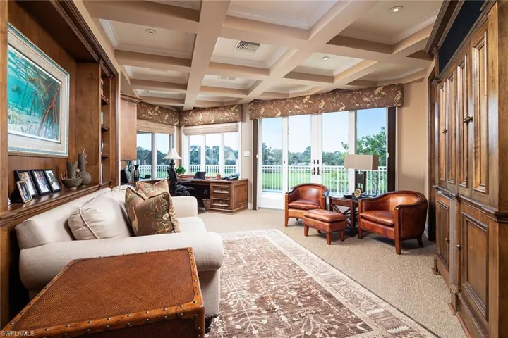Sunroom / solarium featuring coffered ceiling