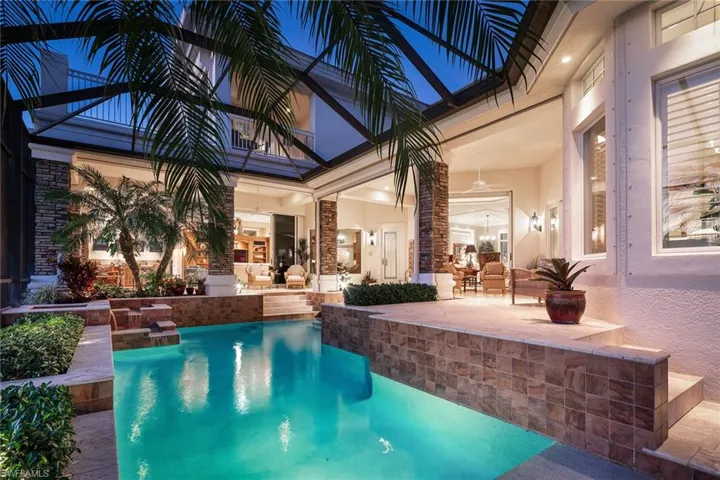 Swimming pool with a patio area