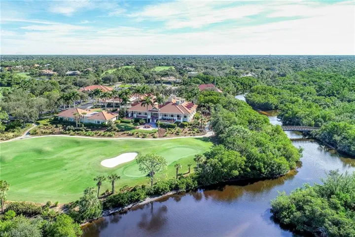 Aerial view of a large body of water and a golf course
