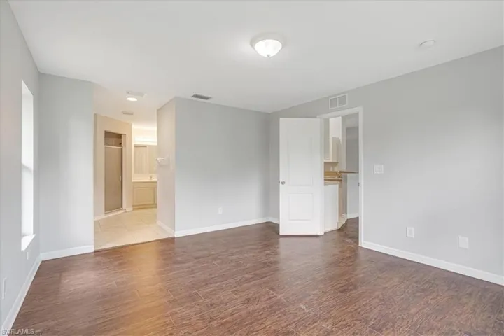 Spare room featuring hardwood / wood-style flooring