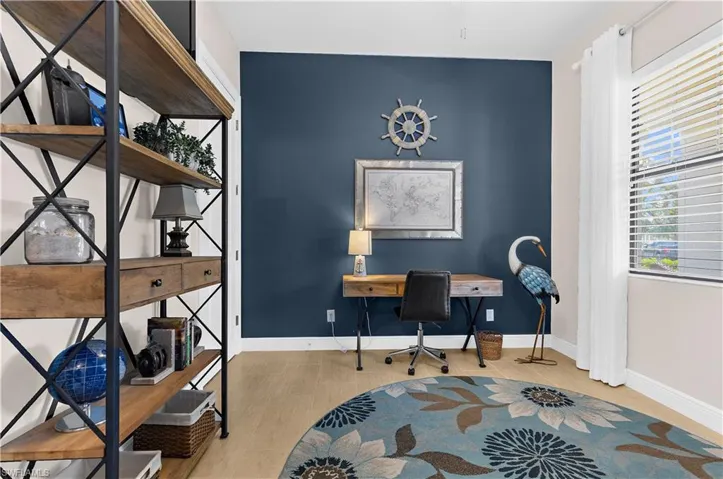 Accent wall featuring a deep blue hue