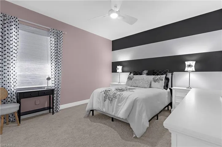 Plush carpet flooring complements painted walls