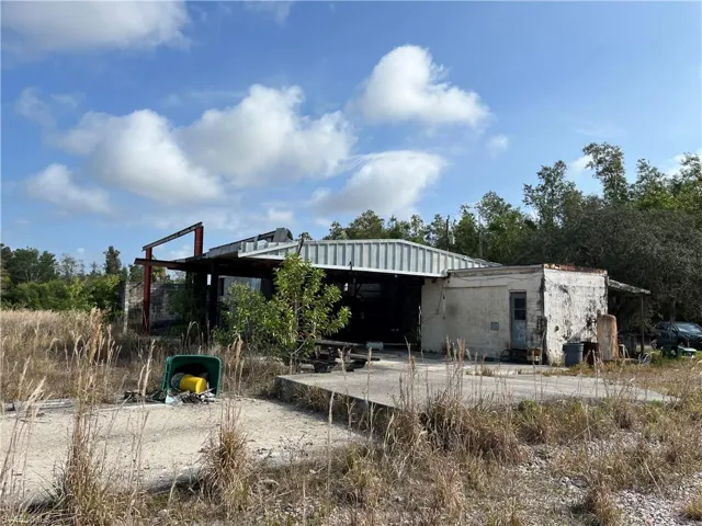 Rear view of house featuring a patio area
